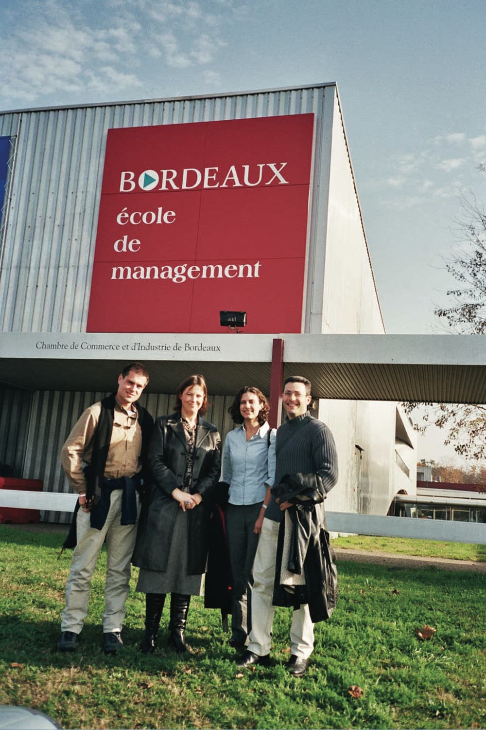 Four Israeli delegates posing outside the Bordeaux School of Management in France.
