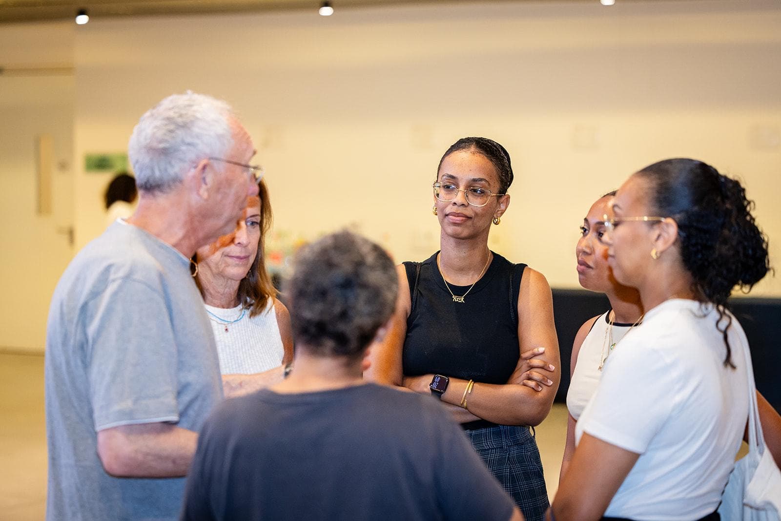 Joey and Carol Low in conversation with a group of the program's alumni.