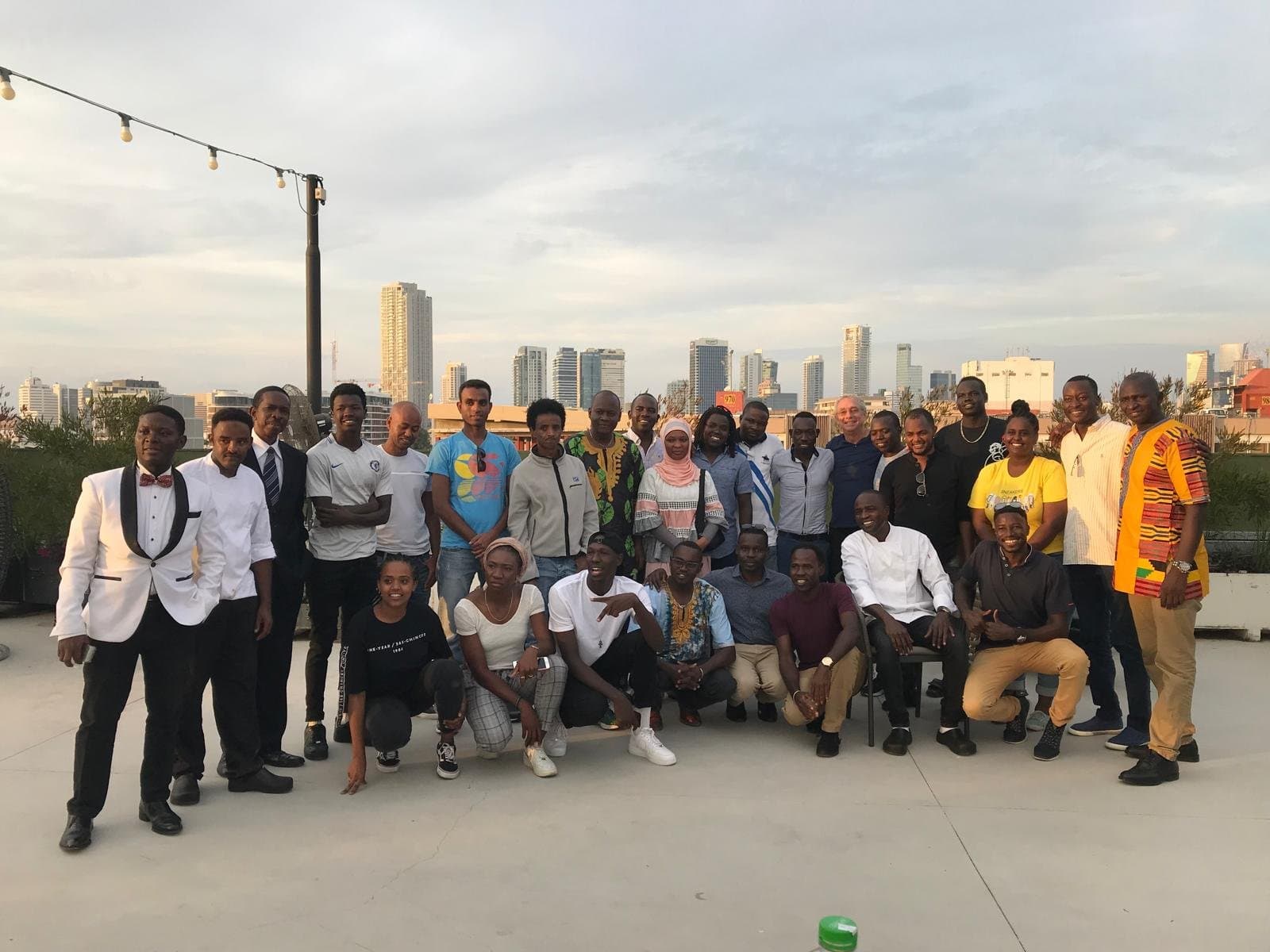 A large group of African students supported by Israel at Heart gathered together for a photograph.